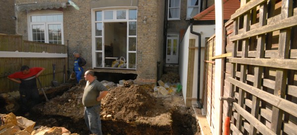 Day one - the guys are digging the foundation trenches by hand