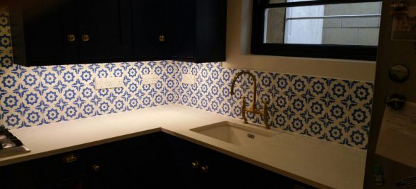 Splashback tiling behind the sink (under cabinet lighting works well in this situation)