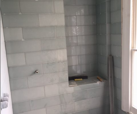 Tiling in the family bathroom on the Kings Road